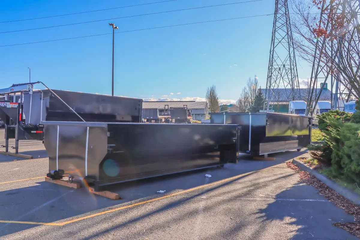 Roll-off dumpster ready for waste disposal at job site for Construction Dumpster Rental in East Lansing